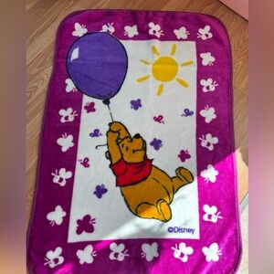 Crib sized vintage Winnie the Pooh fleece blanket